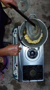 The process of making banana chips Stock Photos