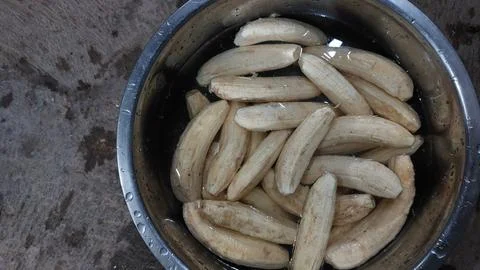 The process of making banana chips Stock Photos