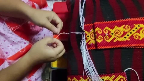 PROCESS OF MAKING BEAD SCARF Video stock 209236311