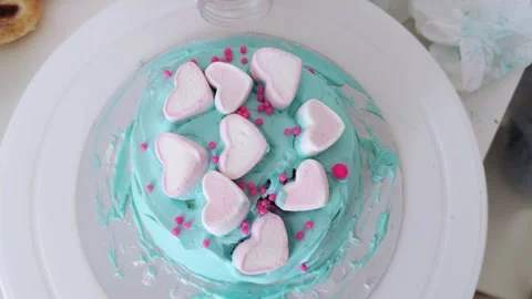 The process of making bento cake children hand. Decorating cake with sprinkles. 動画素材 273711232