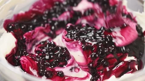 Process of making blueberry cheesecake. Mixing ingredients for the creme. Video stock 154936176