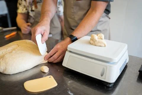 The process of making bread. Dividing the wheat Stock Photos