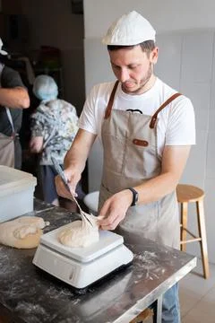 The process of making bread. Dividing the wheat Stock Photos