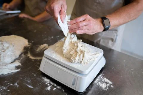 The process of making bread. Dividing the wheat Stock Photos