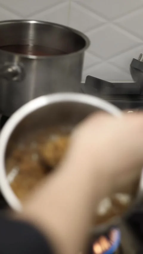 The process of making broth in a professional restaurant kitchen Video stock 332490015