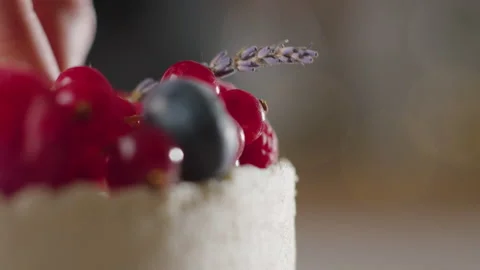 The process of making a cake. The pastry chef decorates the cake Stock Footage 168812038