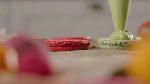 The process of making a cake. The pastry chef decorates the cake Stock Footage 168815980