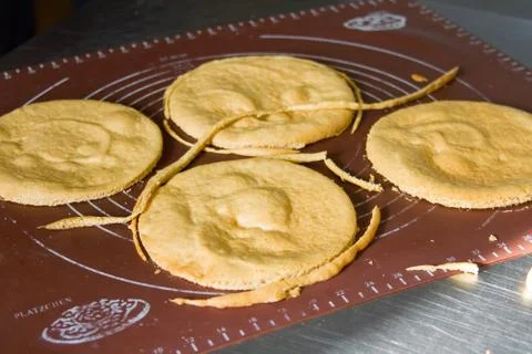 The process of making cakes, baking cakes, preparing to assemble the cake Stock Photos