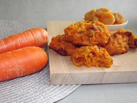 The process of making carrot cookies with the addition of dried apricots 写真素材