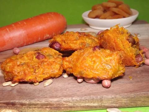 The process of making carrot cookies with the addition of dried apricots 写真素材