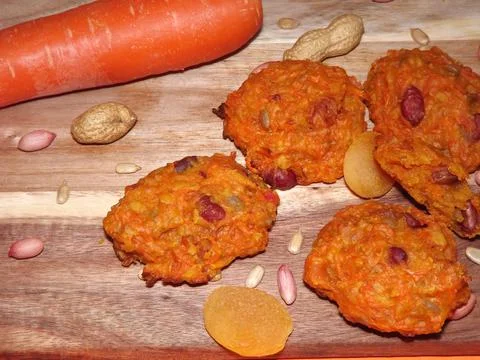 The process of making carrot cookies with the addition of dried apricots 写真素材
