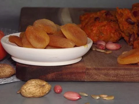 The process of making carrot cookies with the addition of dried apricots 写真素材