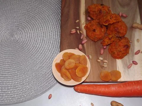 The process of making carrot cookies with the addition of dried apricots 写真素材