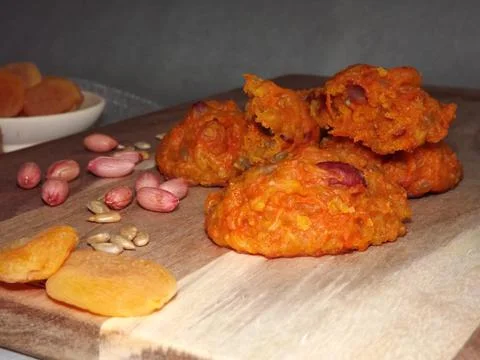 The process of making carrot cookies with the addition of dried apricots 写真素材