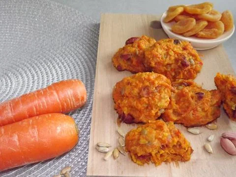 The process of making carrot cookies with the addition of dried apricots 写真素材