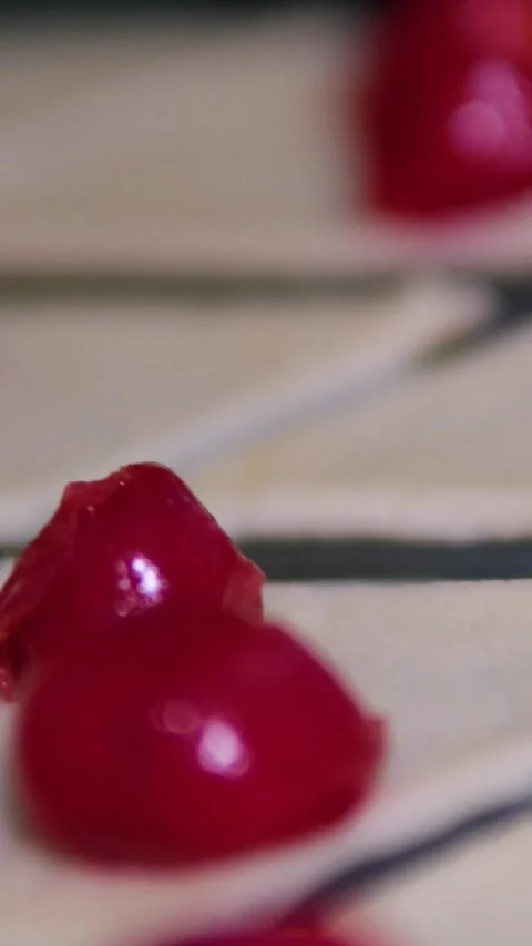 The process of making cherry croissants womans hand wraps cherries or cherries Stock Footage 305979134