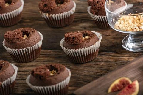 Process of making chocolate cupcakes with nut filling. Homemade muffins with  Stock Photos