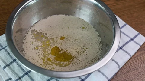 The process of making Ciabatta Olive bread dough in a time-lapse capture Stock Footage 160156479