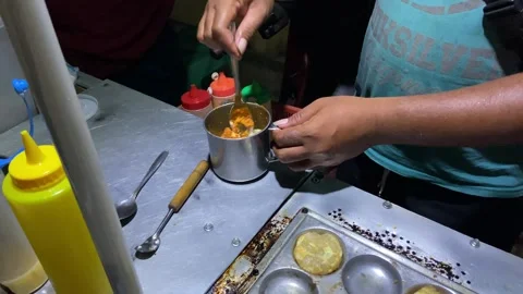 The process of making cilor which is a typical Indonesian street snack Stock Footage 270012699