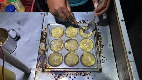 The process of making cilor which is a typical Indonesian street snack Stock Footage 270013149