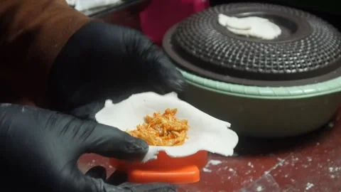 The process of making cireng involves grinding and special molds. Stock Footage 321979739