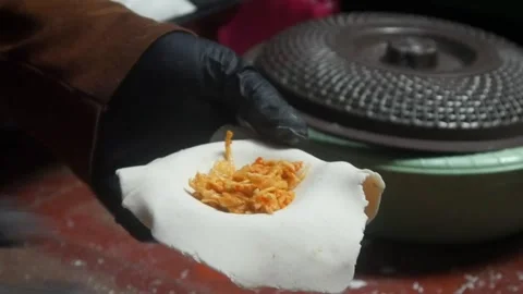 The process of making cireng involves grinding and special molds. Stock Footage 321979740