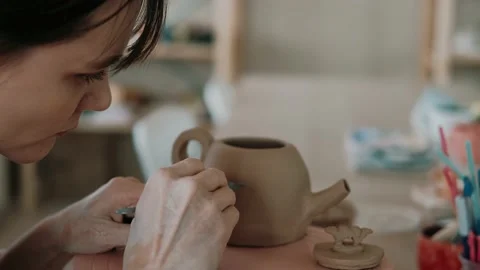 The process of making clay item in the workshop. Decorative tableware made of Stock Footage 152448321