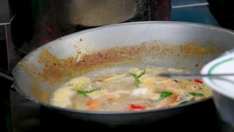 The process of making coconut milk soup in Asia Stock Footage 318027387