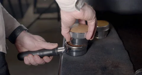 The process of making coffee. 4k. Professional barista. A close-up of a hand Stock Footage 131127331
