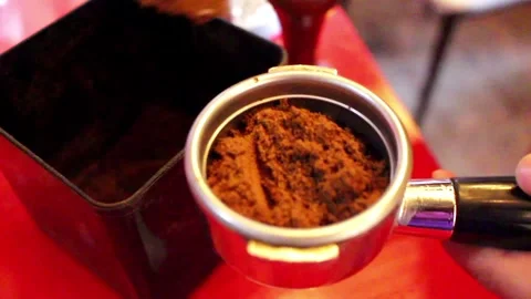 Process Of Making Coffee. Closeup Of Hand Holding A Portafilter Video Stock Footage 272477698