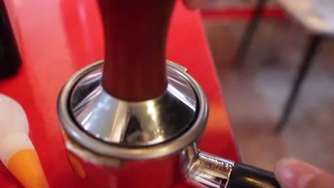 Process Of Making Coffee. Closeup Of Hand Holding A Portafilter Video Stock Footage 272477826