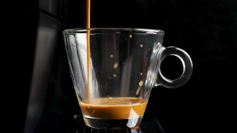 Process of making coffee by coffee machine into glass transparent cup Stock-Footage 148122372