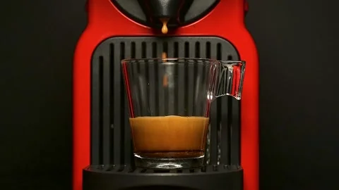 Process of making coffee by coffee machine into glass cup, Stock Footage 158834315