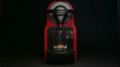 Process of making coffee by coffee machine into glass transparent cup Stock Footage 167753413