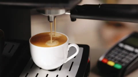 Process of making coffee by coffee machine into cup, espresso coffee coming out Stock-Footage 194792132
