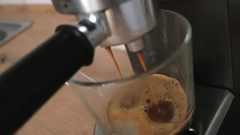 Process of making coffee by coffee machine into glass Video stock 196847692