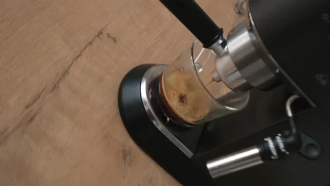 Process of making coffee by coffee machine into glass Stock Footage 196847727