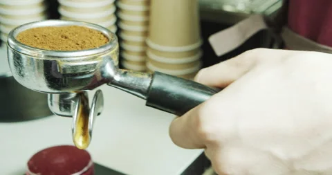 Process of making coffee in a coffee shop. Professional barista preparing coffee Stock Footage 136331955