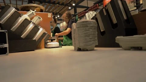 The process of making coffee in a coffee shop and delivering it to a client.  Stock Footage 220227276