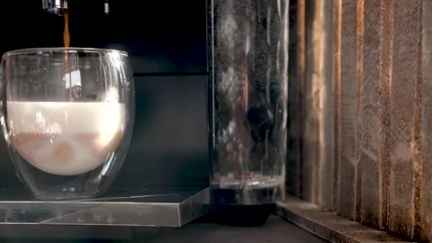 Process of making coffee with milk on a professional coffee machine Stock Footage 149527298