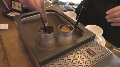 The process of making coffee in the sand Stock-Footage 76159443