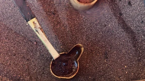 The process of making coffee in the sand Stock Footage 128907635