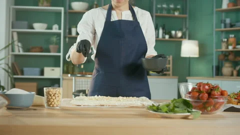 The Process of Making Confectionery. The Chef Sprinkles the Cake With Nuts. Video stock 162740974