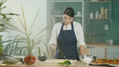 The Process of Making Confectionery. The Chef Sprinkles the Cake With Nuts. Stock Footage 163158319