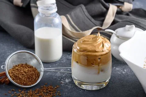 Process of making dalgona coffee on gray kitchen table Stock Photos