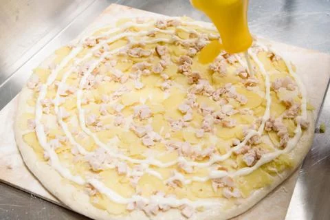 Process of making, decorating, preparing pizza. Close up Stock Photos