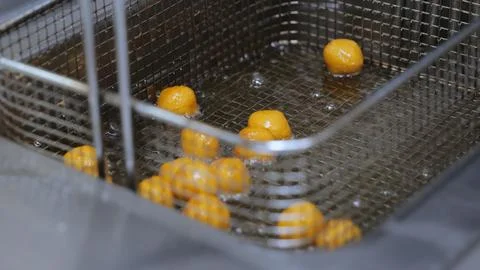 The process of making deep-fried cheese balls, deep-fried cheese balls in Stock Photos