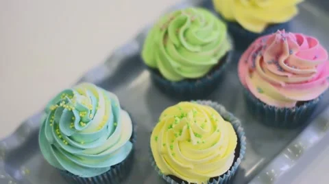 Process of making delicious cupcakes in a bakery shop Stock Footage 57531448
