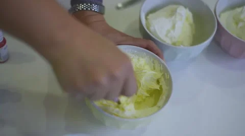 Process of making delicious cupcakes in a bakery shop Stock Footage 57531489