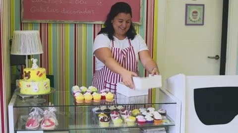 Process of making delicious cupcakes in a bakery shop Stock Footage 57531523